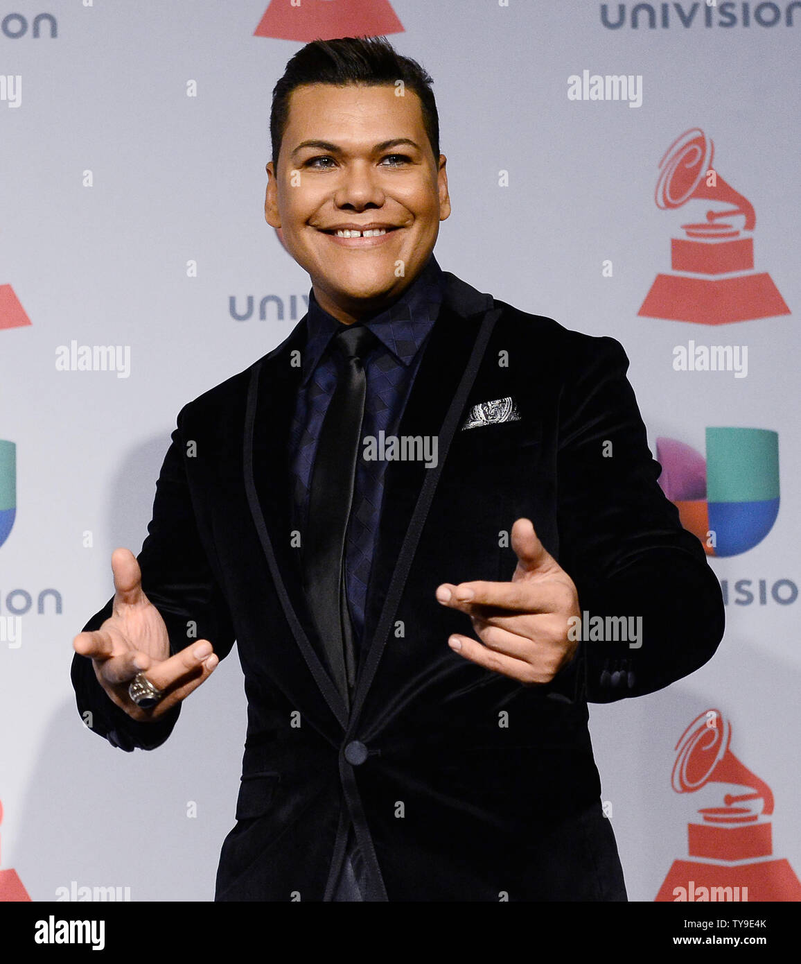 Singer Victor Florencio appears backstage at the Latin Grammy Awards at