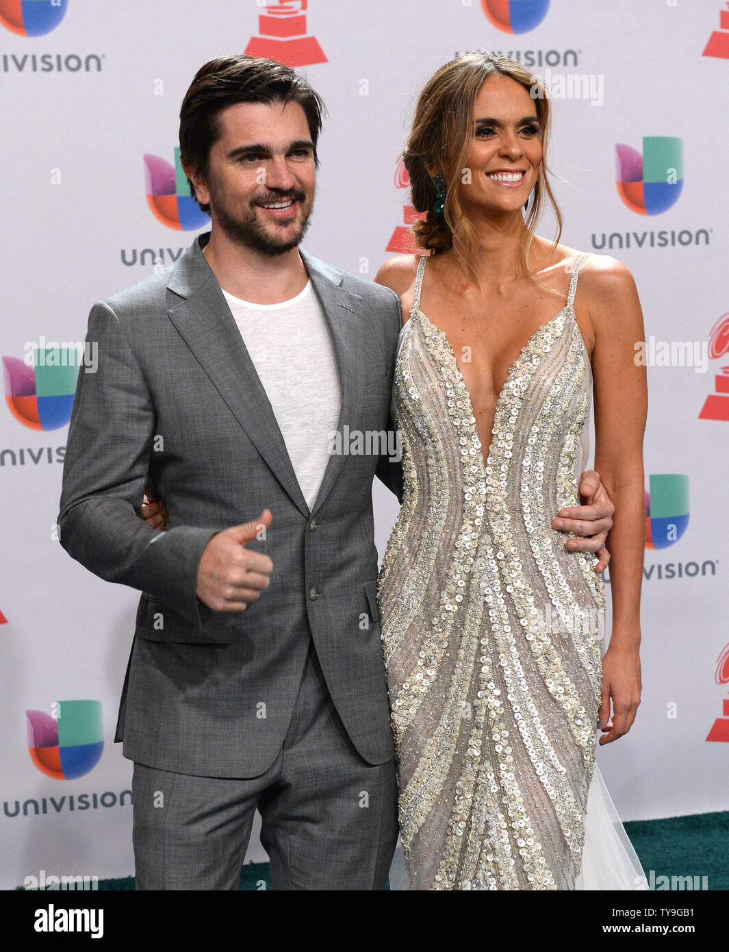 Singer Juanes and wife Karen Martinez arrive for the 15th annual Latin  Grammy Awards at the