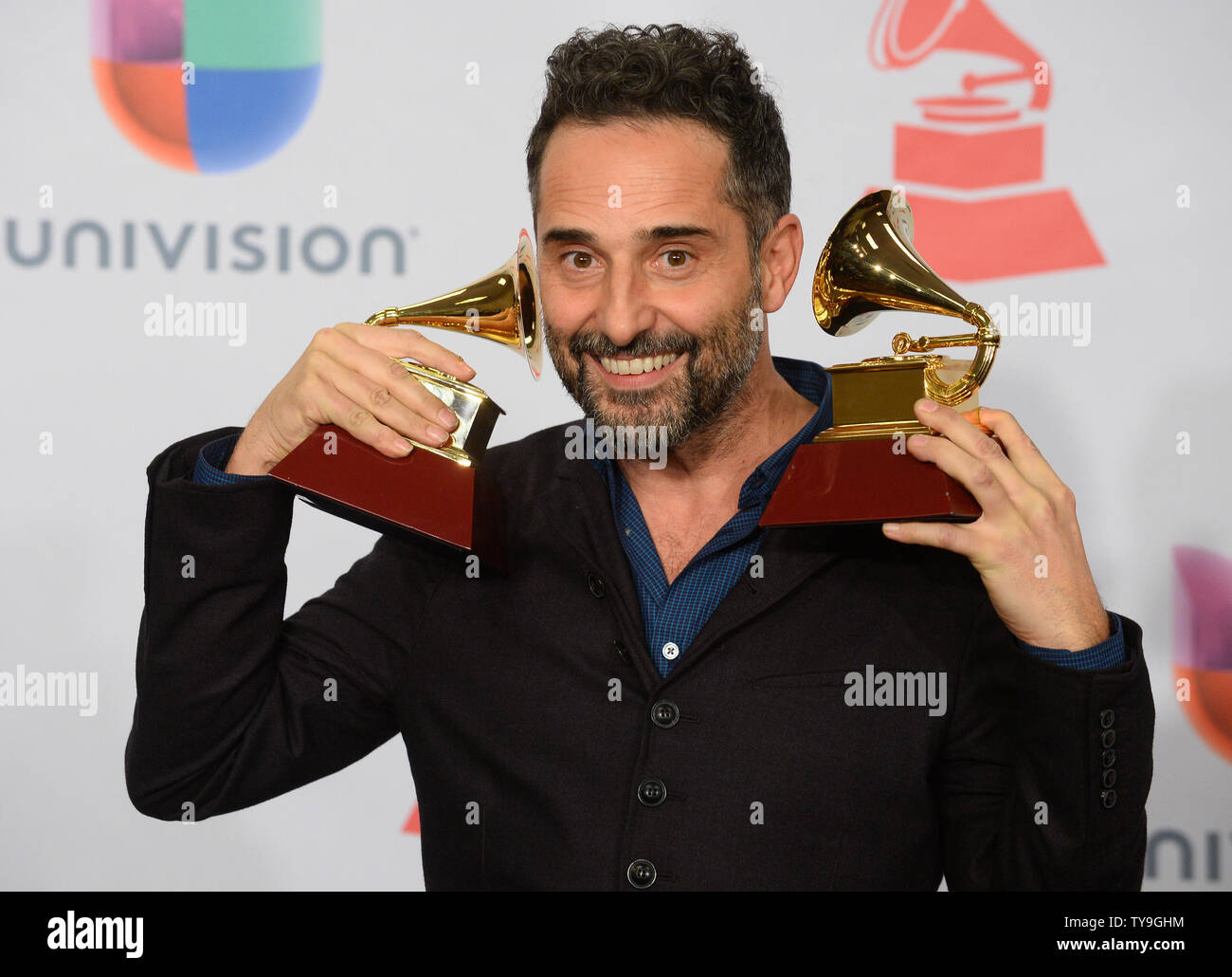 Drexler poses backstage with the awards for Record of the Year