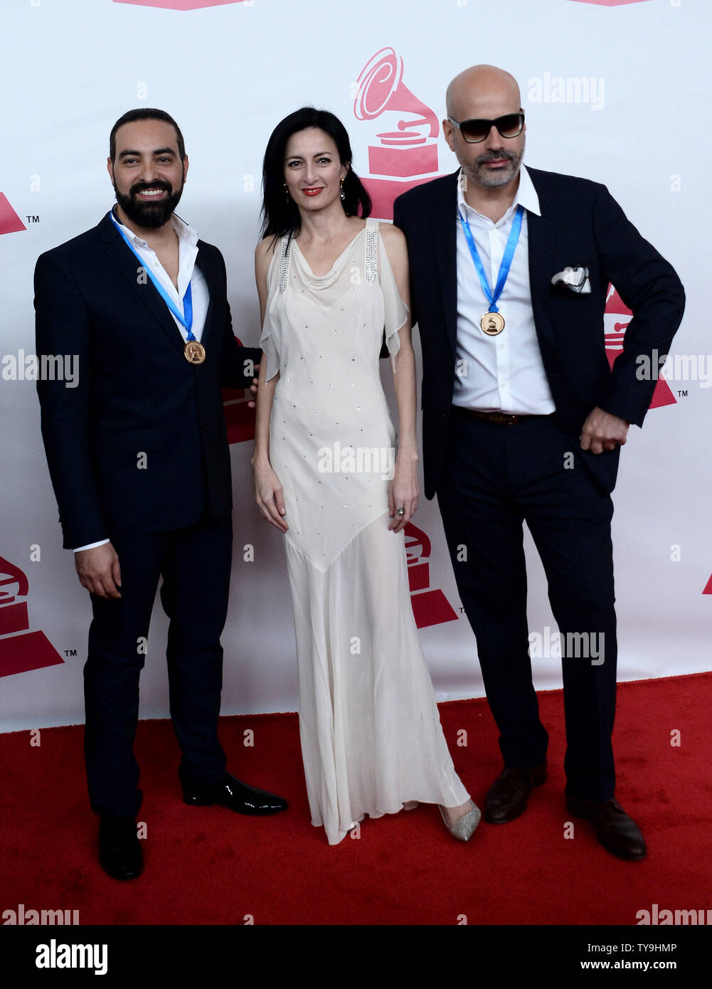 From left, Cucu Diamantes, Alain Perez and Andres Levin arrive for the Latin Recording Academy Person of the Year tribute to Brazilian singer/songwriter Roberto Carlos at the Mandalay Bay Convention Center in Las Vegas, Nevada on November 18, 2015.   Photo by Jim Ruymen/UPI Stock Photo