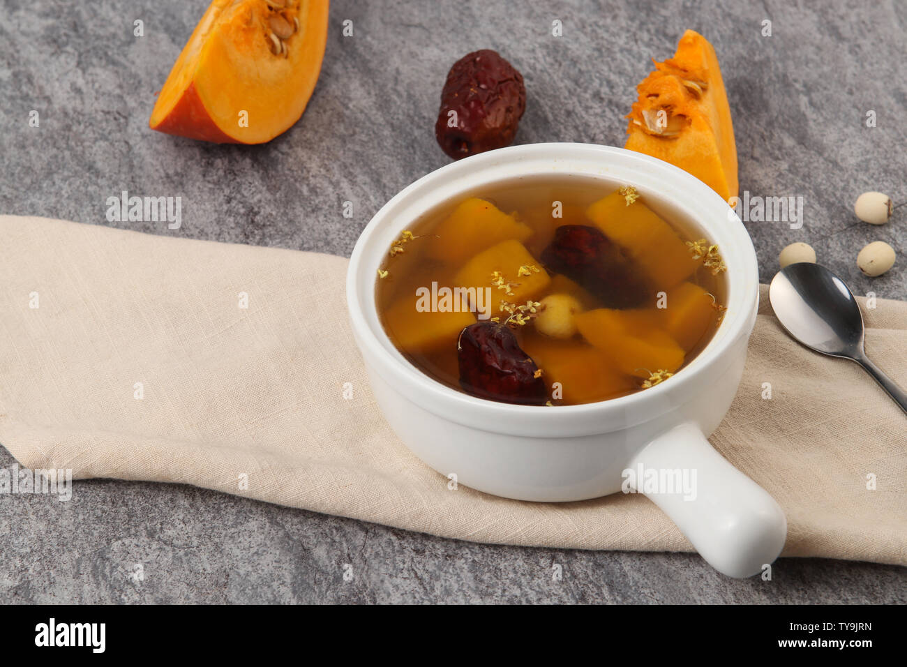 Pumpkin, jujube, lotus seeds, sugar water. Stock Photo
