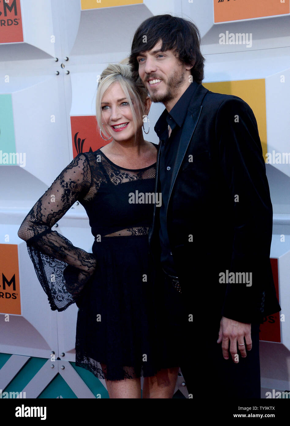 Singer Chris Janson (R) and Kelly Lynn attend the 51st annual Academy ...