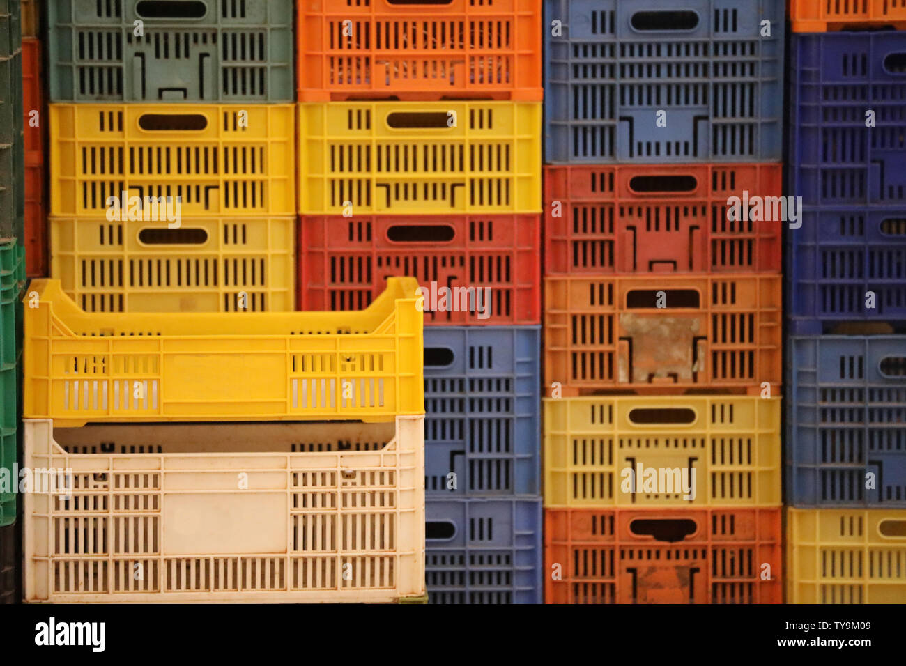 Stacked crates in front of a supermarket Stock Photo Alamy