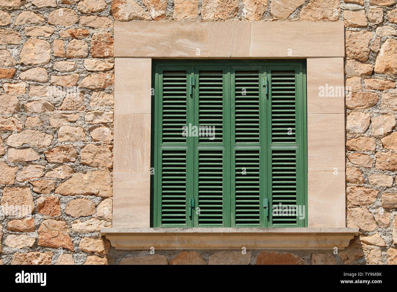 Window grilles folding shutters in Southern Europe Stock Photo Alamy