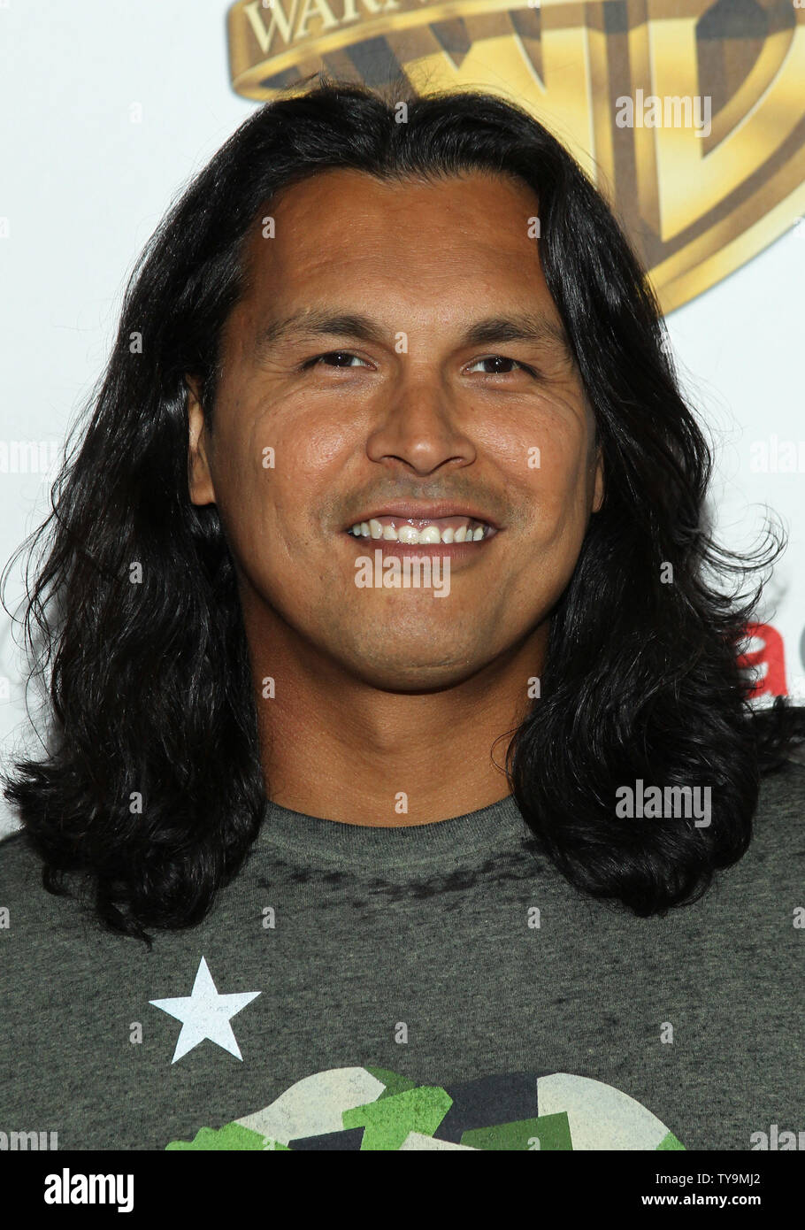 Adam Beach arrives for the Warner Bros. Pictures Presentation at