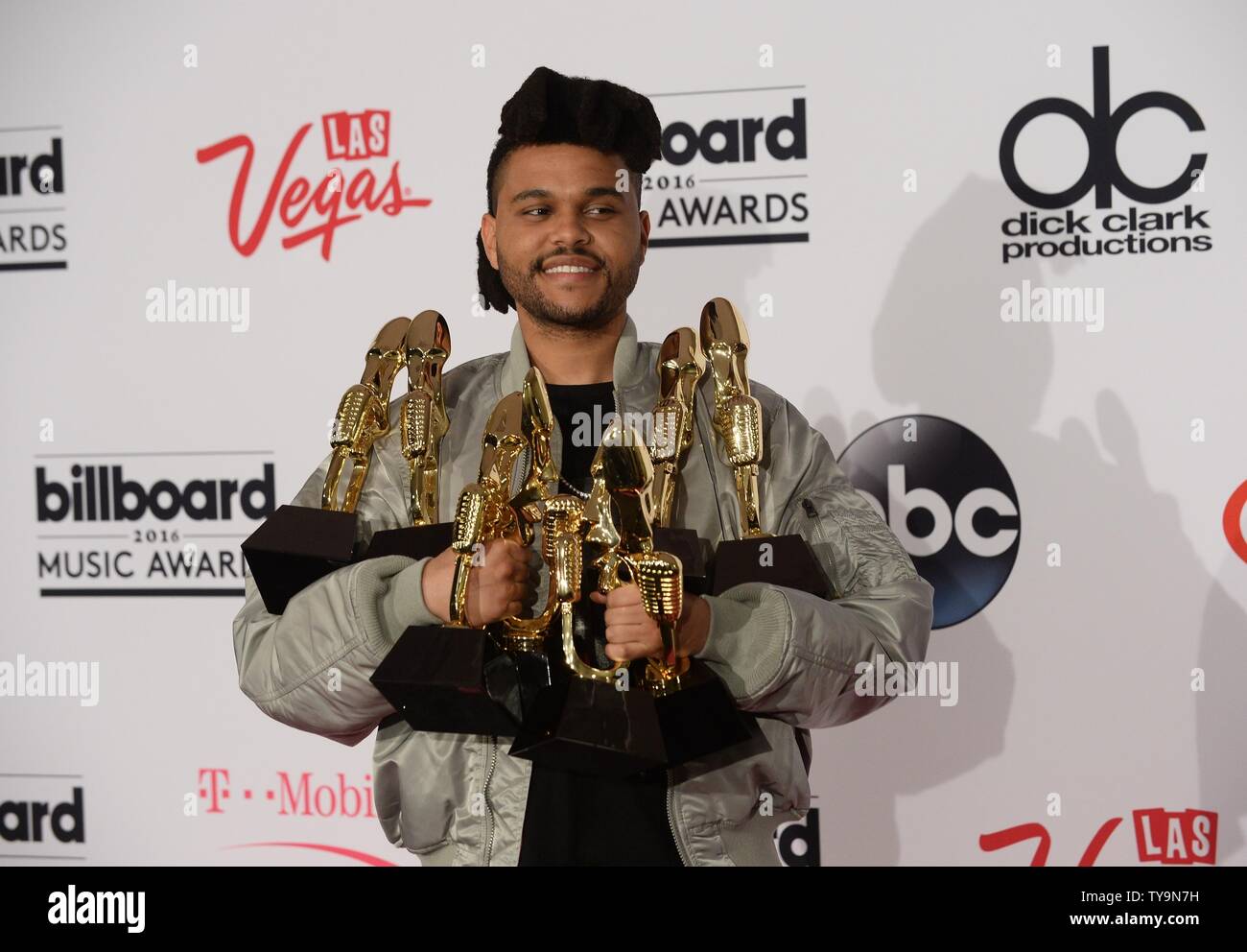 Weeknd Best Singer Singer The Weeknd appears backstage with his 8 Awards for Top Hot 100 ...