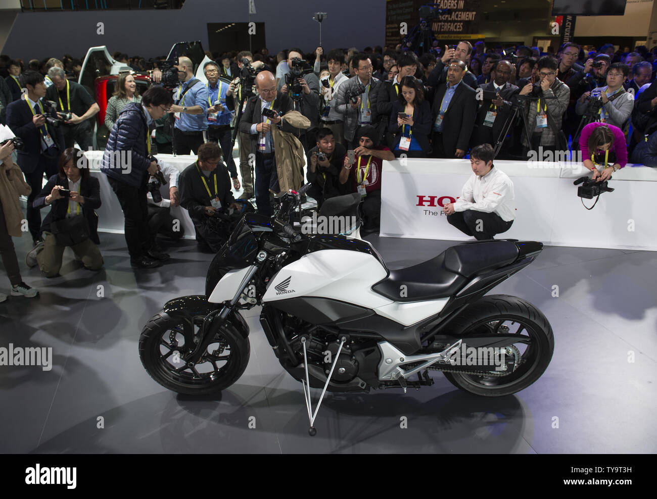The Honda Riding Assist Motorcycle and the Honda Uni-Cub, a personal transportation device, are introduces at the 2017 International CES, a trade show of consumer electronics, in Las Vegas, Nevada,  January 5, 2017.    Photo by Molly Riley/UPI Stock Photo