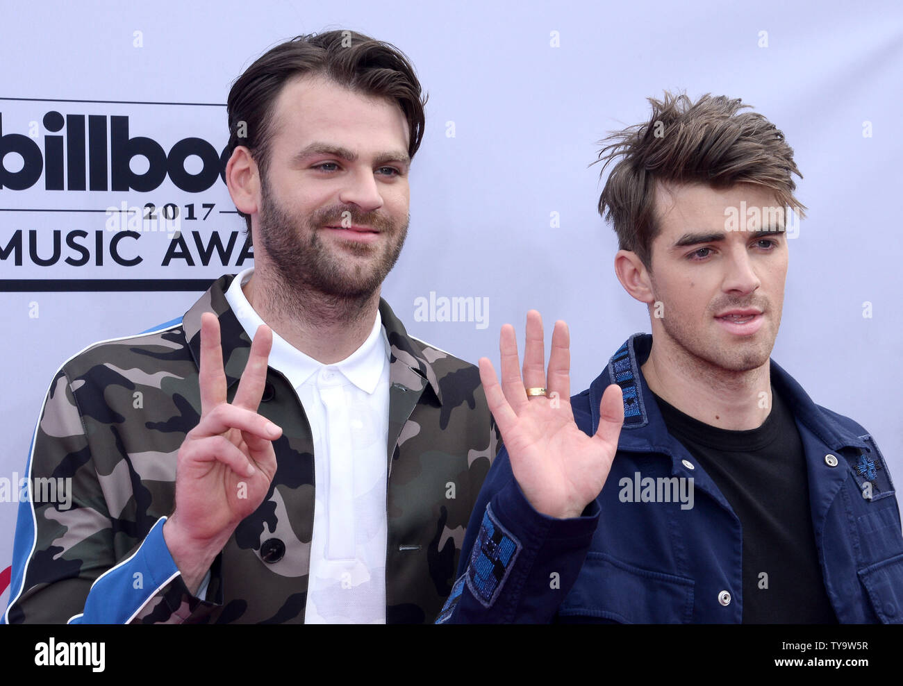 DJs Alex Pall (L) and Andrew Taggart of The Chainsmoker attend the ...
