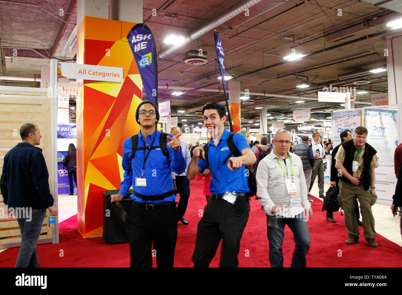 Two CES customer service representatives playfully posing with their