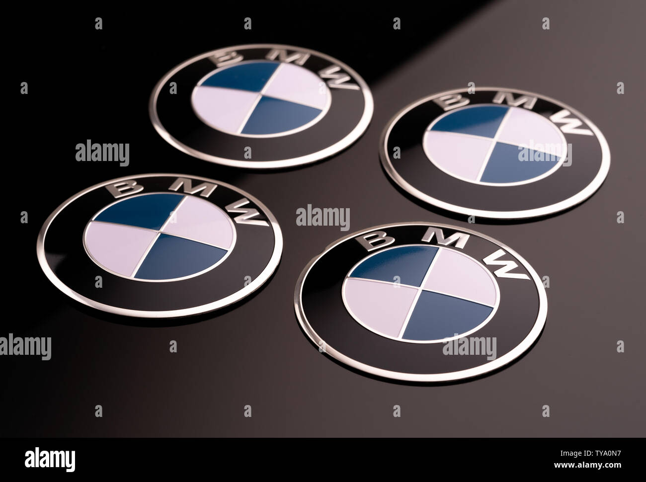 Krasnoyarsk, Russia, 26 june 2019: 4 wheel cover with the BMW logo cap. close-up, black background. Stock Photo