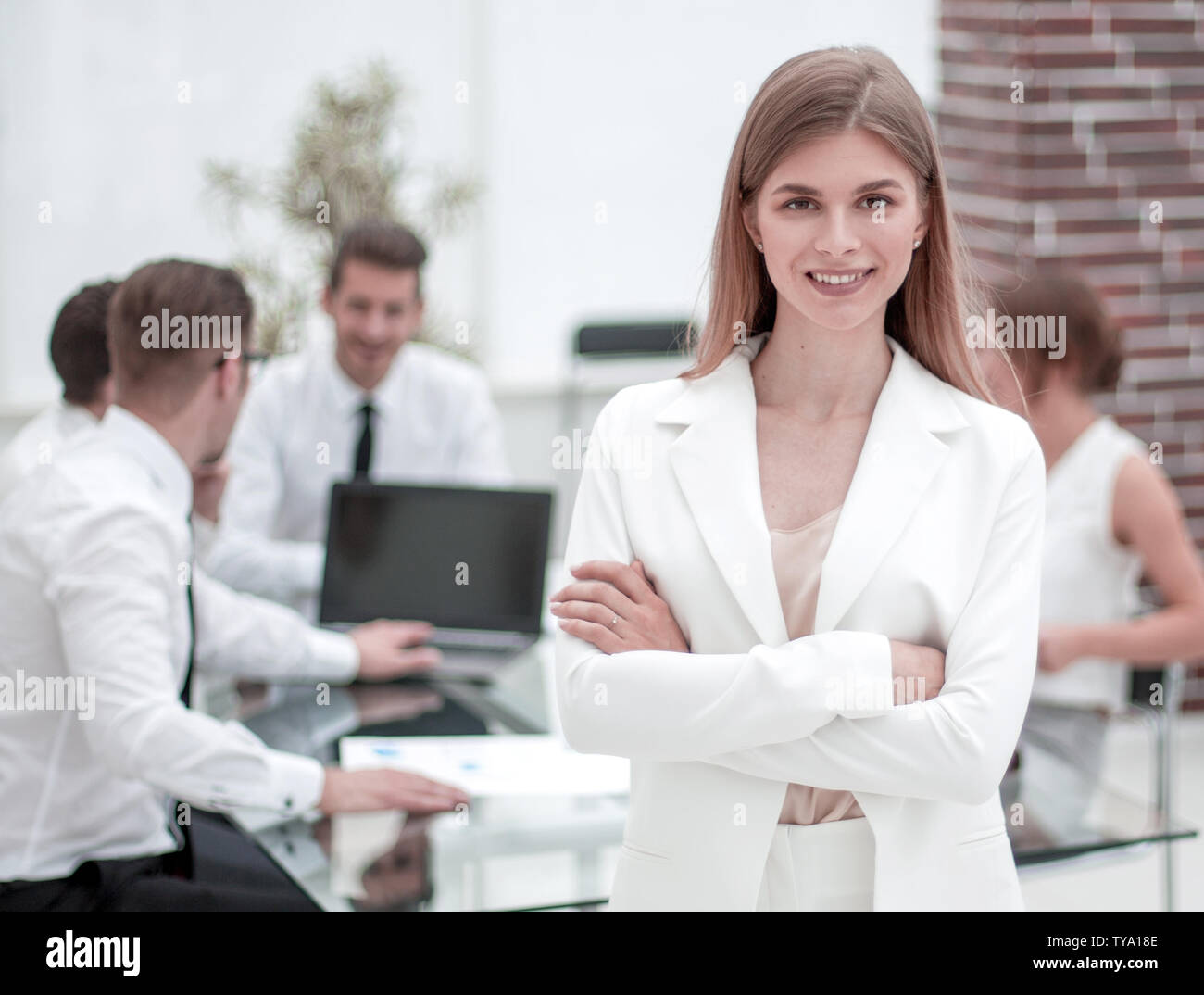 young employee standing in the office Stock Photo - Alamy