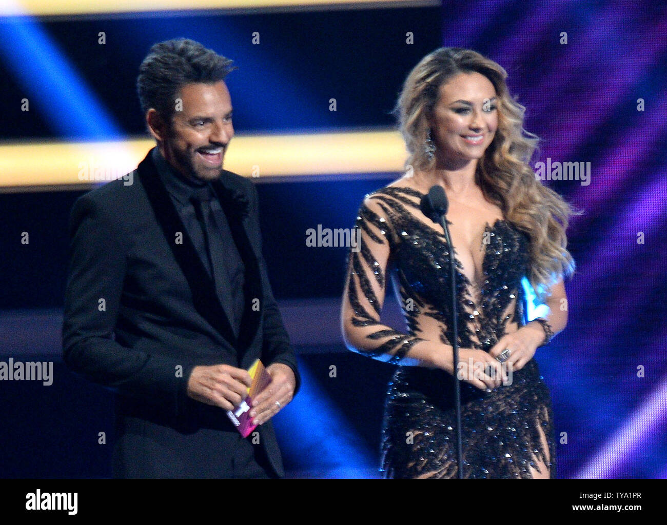 Eugenio Derbez (L) and Aracely Arambula present an award onstage during the 2018 Billboard Latin Music Awards at the Mandalay Bay Events Center in Las Vegas, Nevada on April 26, 2018. Photo by Jim Ruymen/UPI Stock Photo