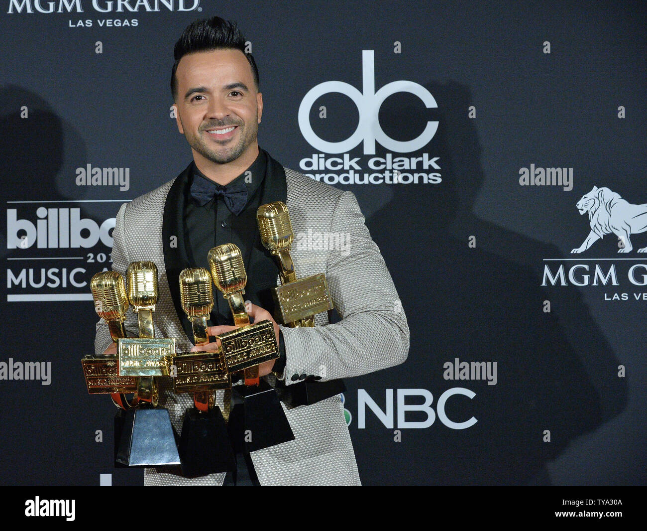 Recording Artist Luis Fonsi Appears Backstage After Winning Awards