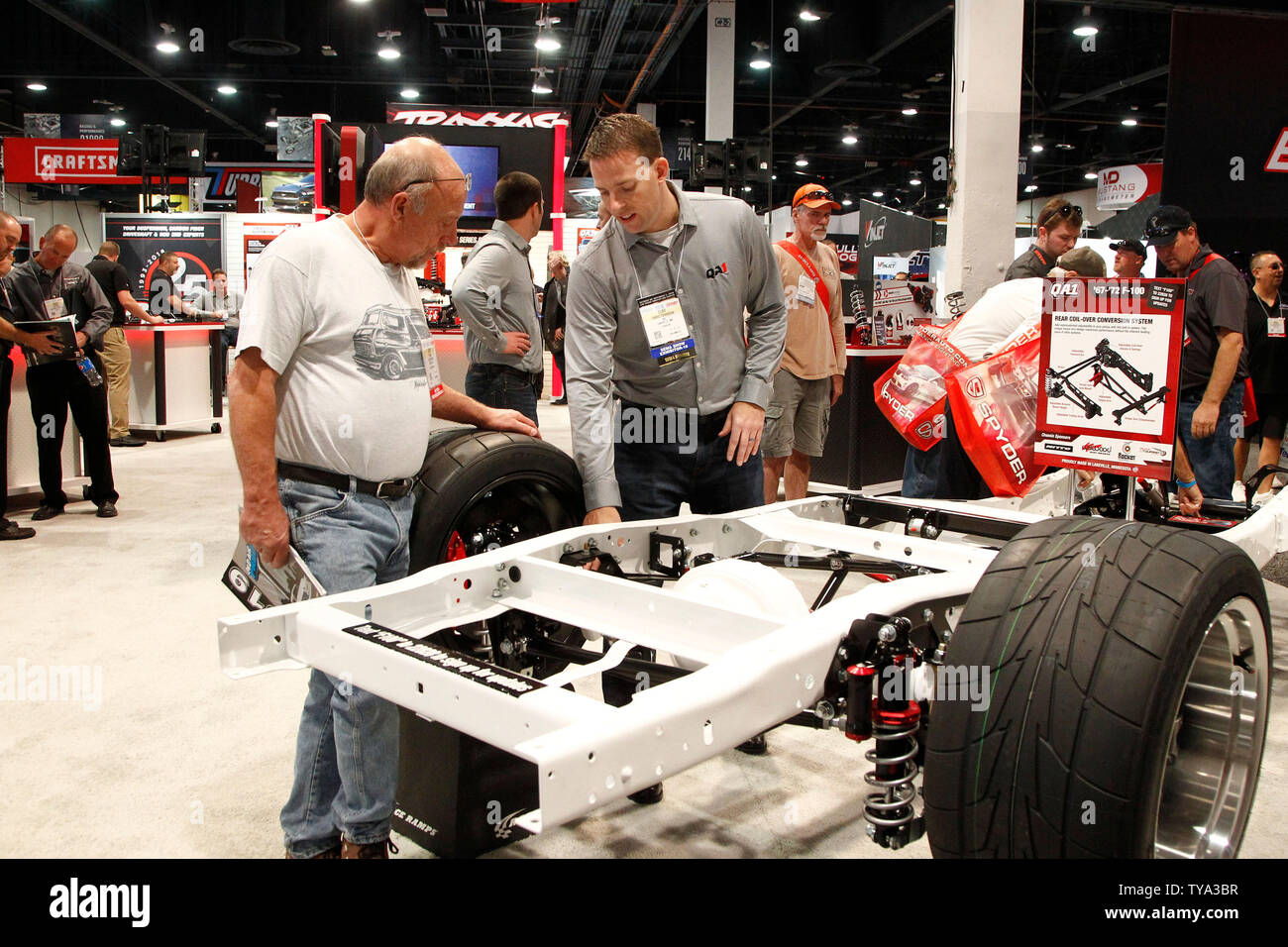 Exhibitor Cliff Christopherson demonstrates the QA1's Rear Coil-Over Conversion Kits to an attendee during the 2018 SEMA Show, at the Las Vegas Convention center in Las Vegas, Nevada, October 30, 2018. Photo by James Atoa/UPI Stock Photo