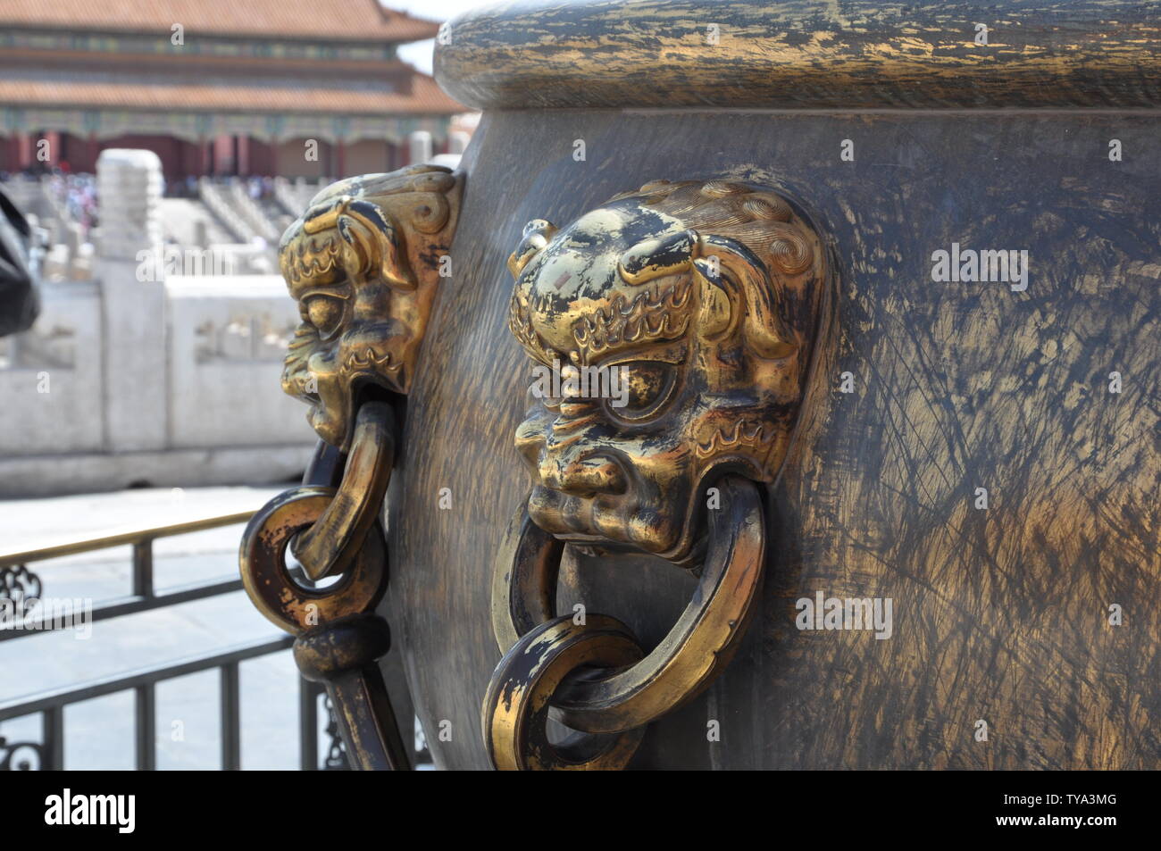 Beijing Imperial Palace gods and beasts, copper lions, large copper cylinders Stock Photo