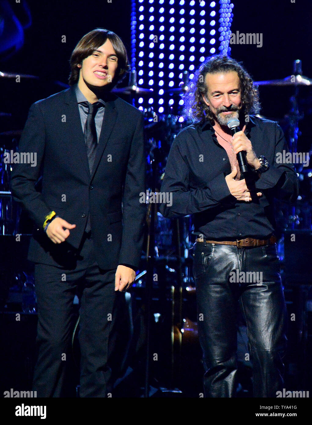 Dani Cano (L) and Jose Maria Cano perform 'Eres Mi Religion' onstage at the Latin Grammy Person of the Year gala honoring Mexican rock band Mana at the Mandalay Bay Convention Center in Las Vegas, Nevada on  November 14, 2018.   Photo by Jim Ruymen/UPI Stock Photo