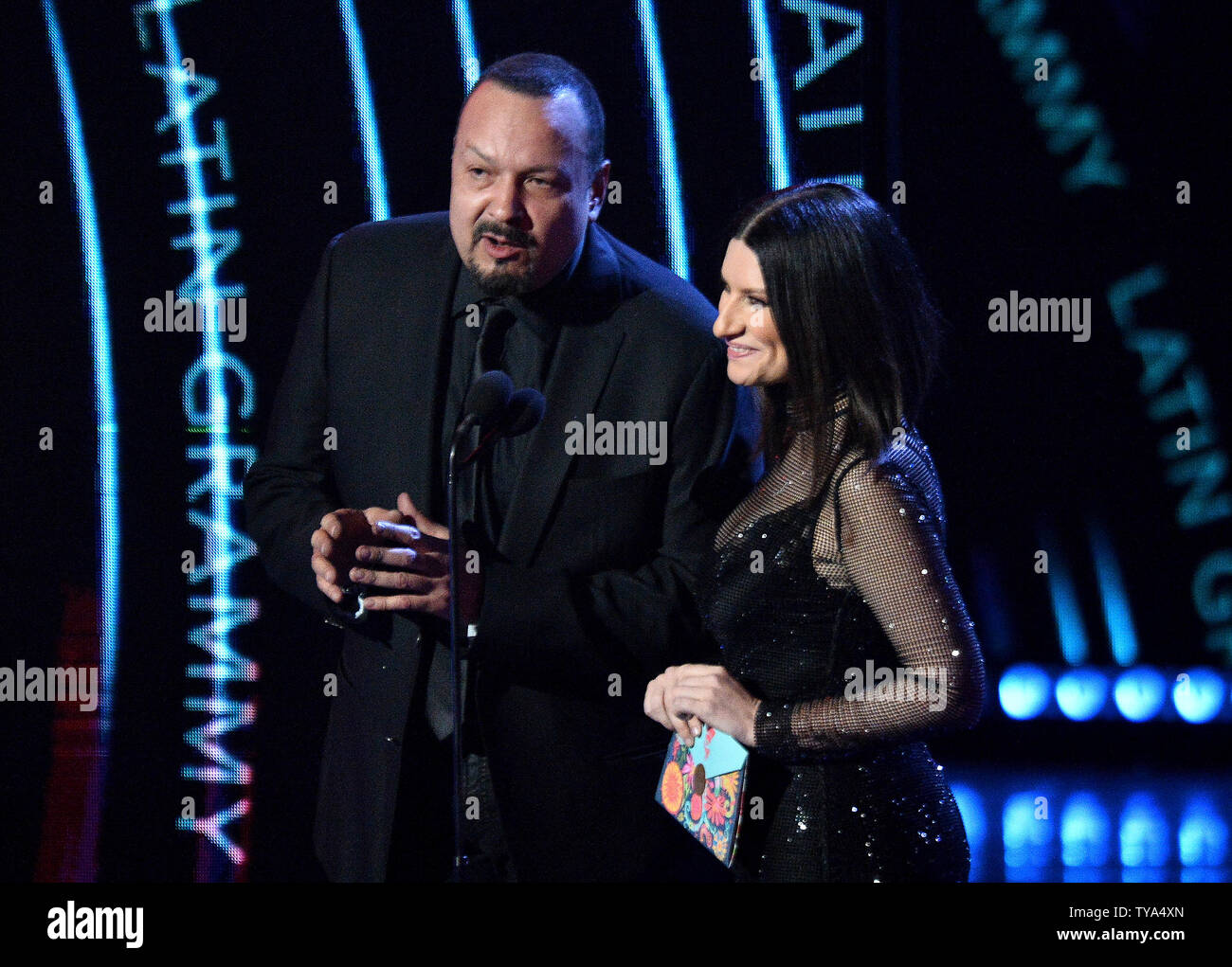Presenters Pepe Aguilar and Laura Pausini speak onstage during the 19th annual Latin Grammy Awards at the MGM Garden Arena in Las Vegas, Nevada on November 15, 2018. Photo by Jim Ruymen/UPI Stock Photo