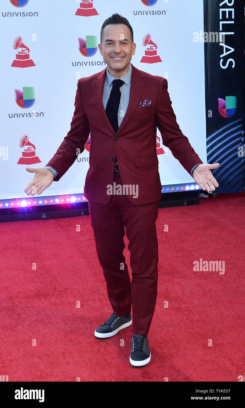 Carlos Calderon arrives on the red carpet for the 19th annual Latin