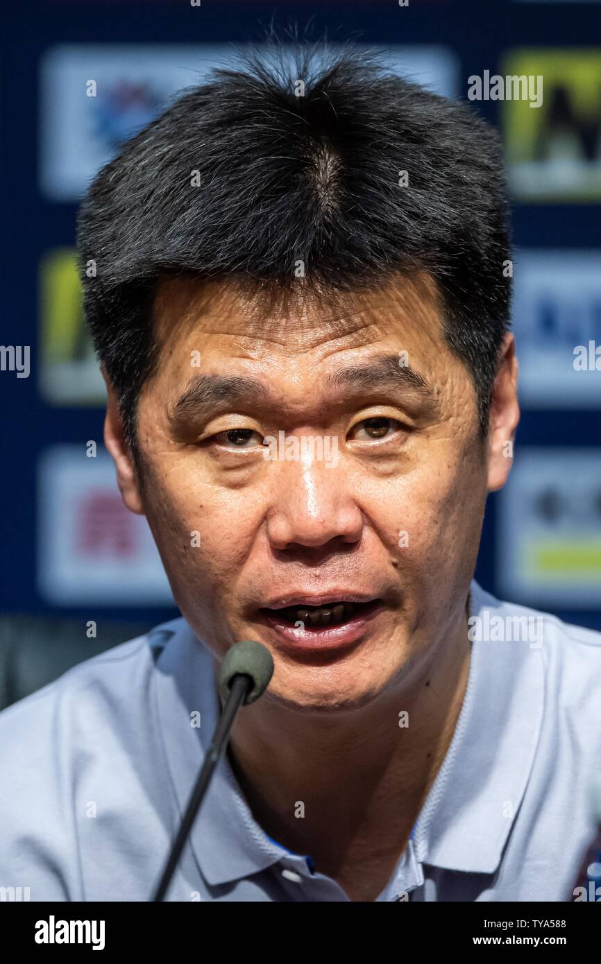Head coach Li Xiaopeng of China's Shandong Luneng Taishan F.C. attends a press conference after the eighth-final match against China's Guangzhou Evergrande Taobao F.C. during the 2019 AFC Champions League in Ji'nan city, east China's Shandong province, 25 June 2019. Stock Photo