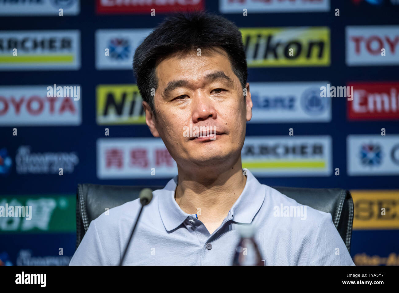 Head coach Li Xiaopeng of China's Shandong Luneng Taishan F.C. attends a press conference after the eighth-final match against China's Guangzhou Evergrande Taobao F.C. during the 2019 AFC Champions League in Ji'nan city, east China's Shandong province, 25 June 2019. Stock Photo