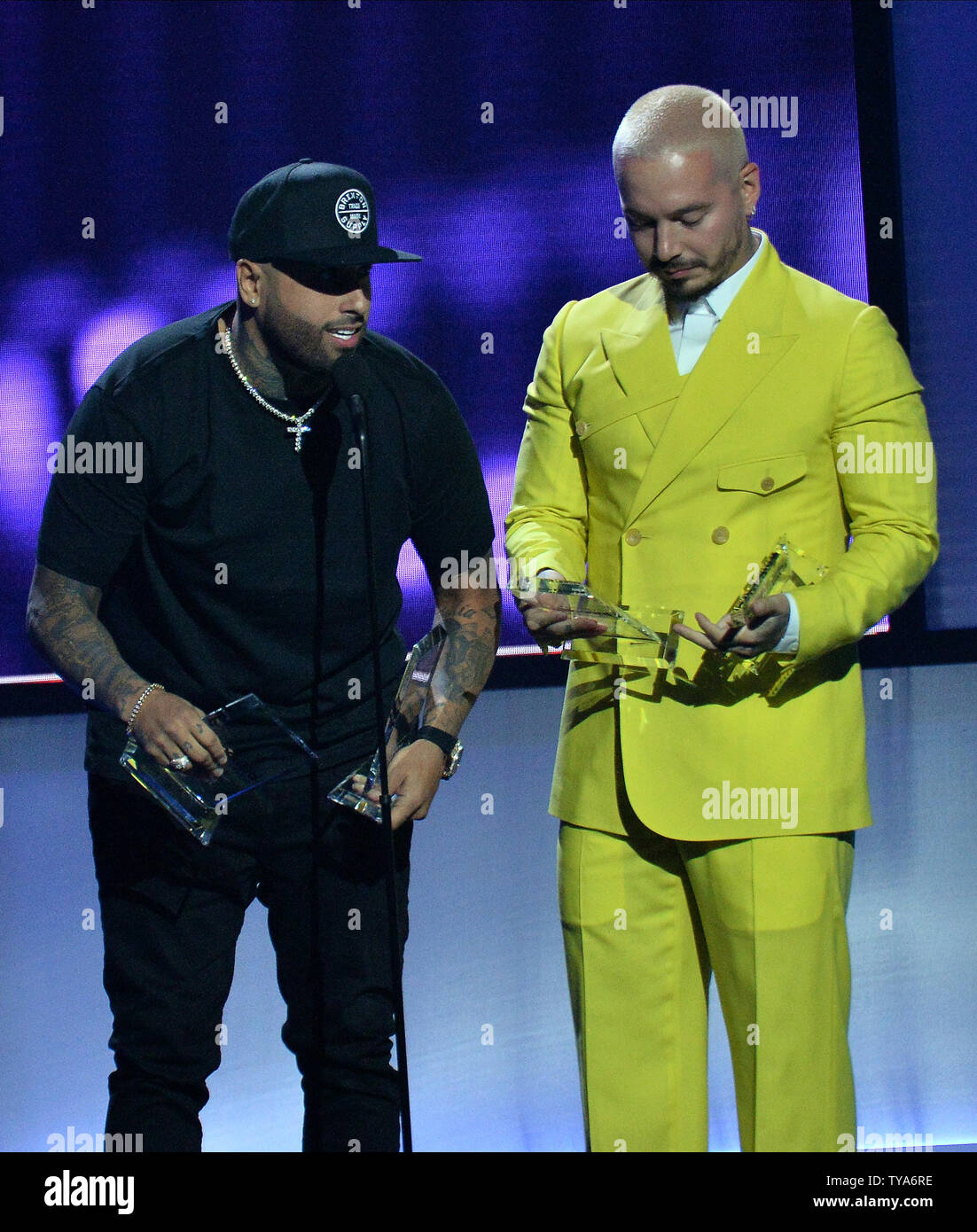 Nicky Jam and J Blavin (R) accept their Airplay Song of the Year award ...