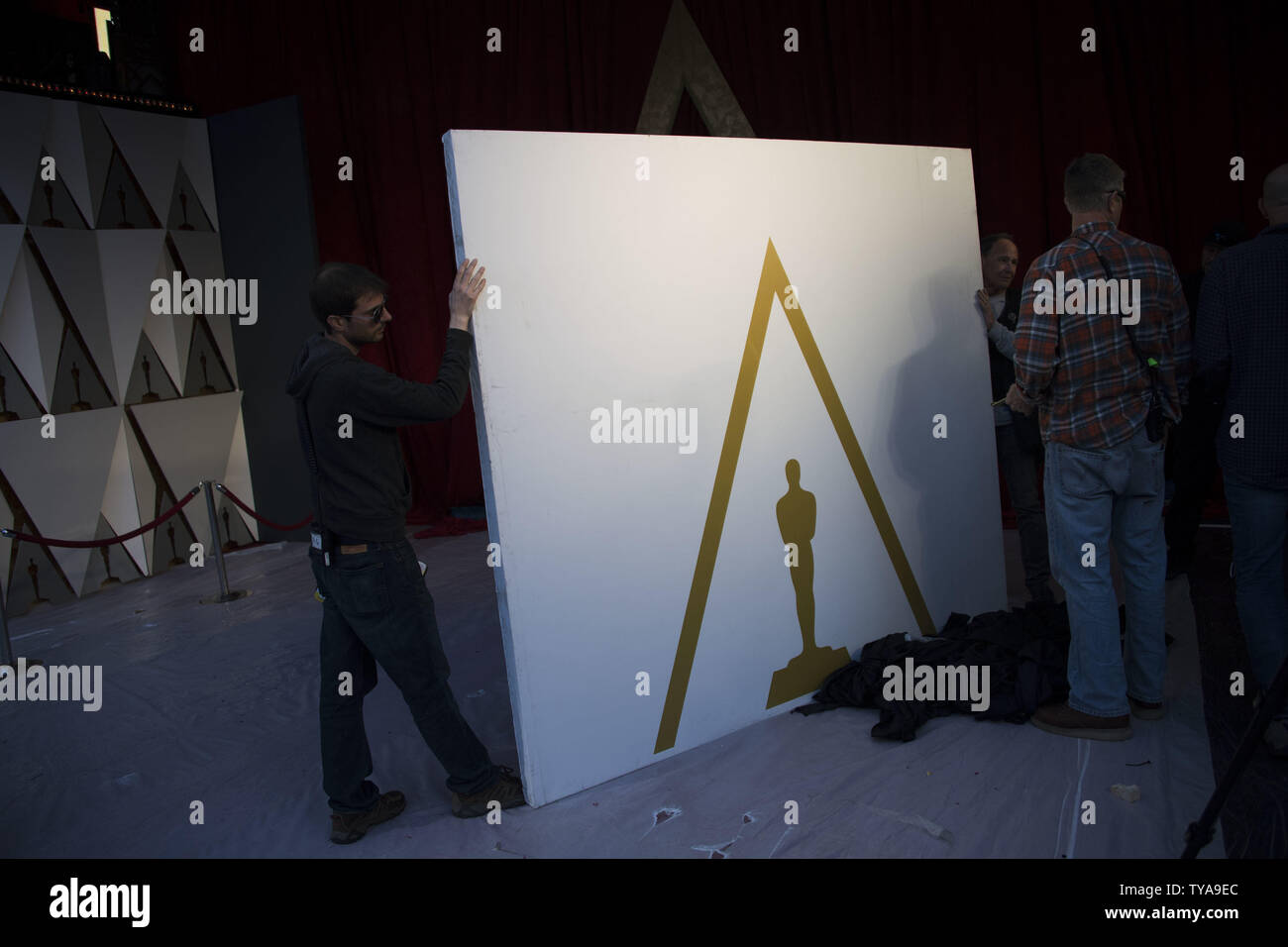 Workers move Oscar signage as preparations are underway for the 89th annual Academy Awards in the Hollywood section of Los Angeles on February 23, 2017. The 2017 Academy Awards will take place this Sunday. Photo by Kevin Dietsch/UPI Stock Photo