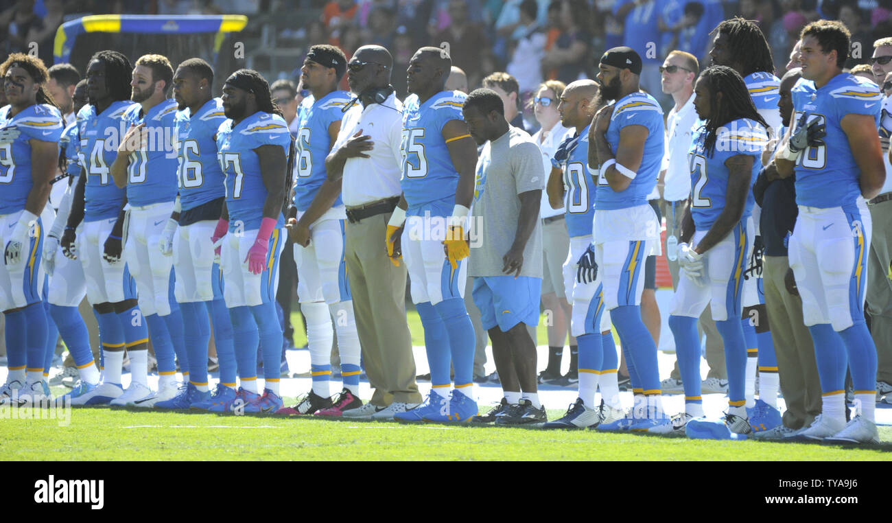 Los Angeles Chargers vs. Denver Broncos . Fans support on NFL Game.  Silhouette of supporters, big screen with two rivals in background Stock  Photo - Alamy