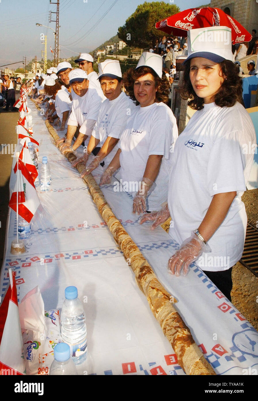 Residents of Kfar Katra village in Mount Lebanon, 24 miles southeast of Beirut, roll the longest