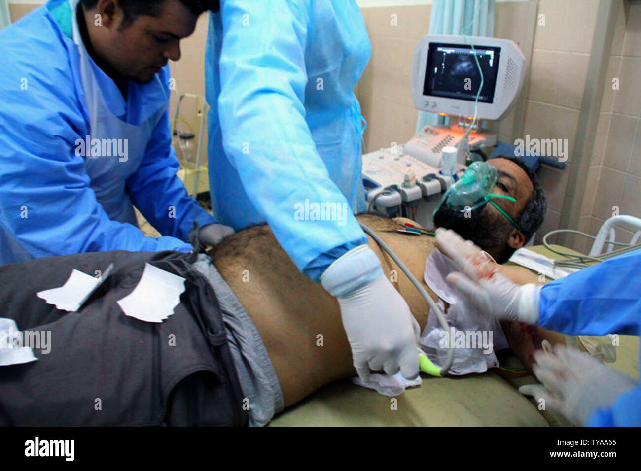 Medics treat a wounded person at a hospital in Benghazi, Libya, on February 25, 2011. Euphoria in Libya's second city Benghazi gave way to growing concern that it remains vulnerable to a counter-attack by Gaddafi's forces.   UPI Stock Photo