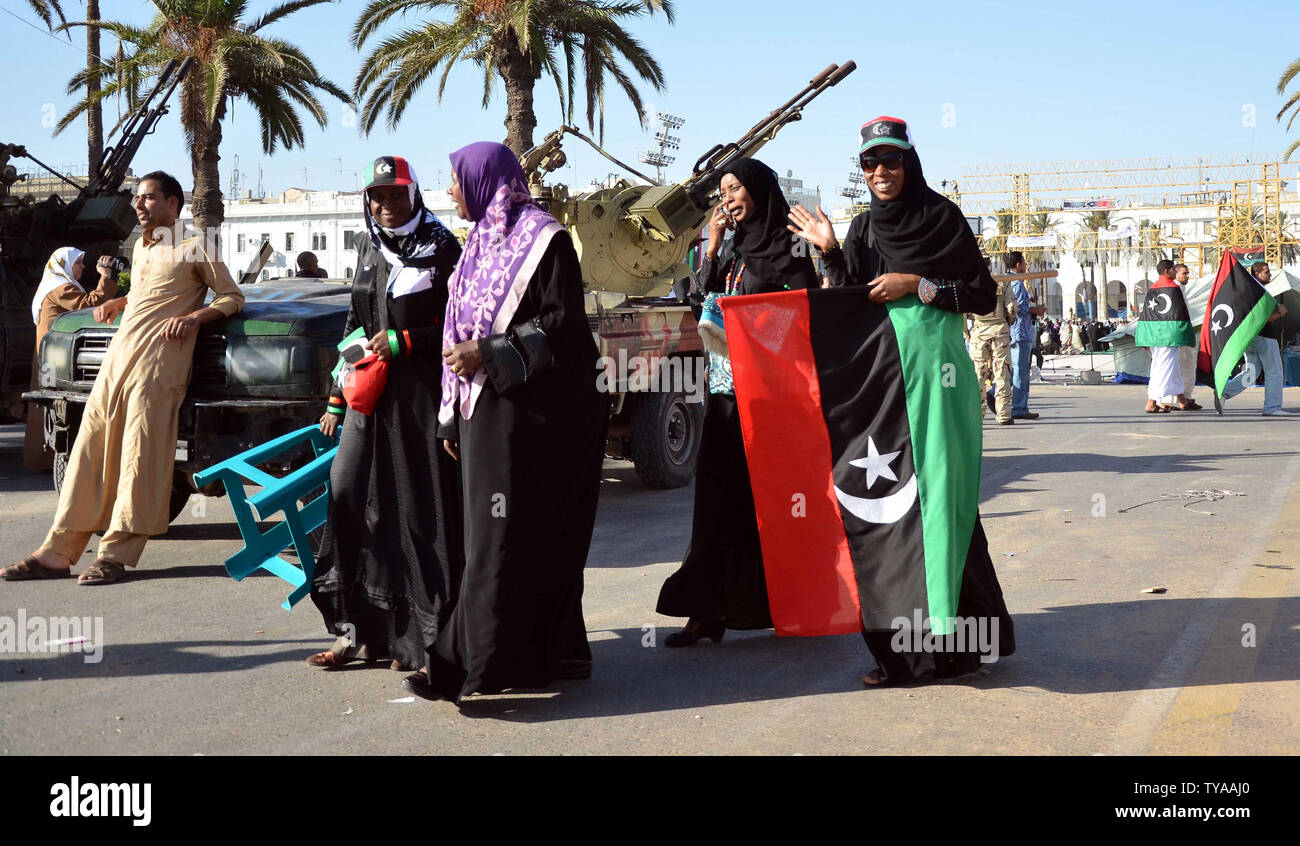 People gather at Martyr Square formerly known as Green Square, for the Eid Al-Fitr prayer on August 31, 2011 in Tripoli, Libya. Libyans celebrated the first Eid Al-Fitr in 42 years under a new regime. UPI/Tarek Elframawy.. Stock Photo
