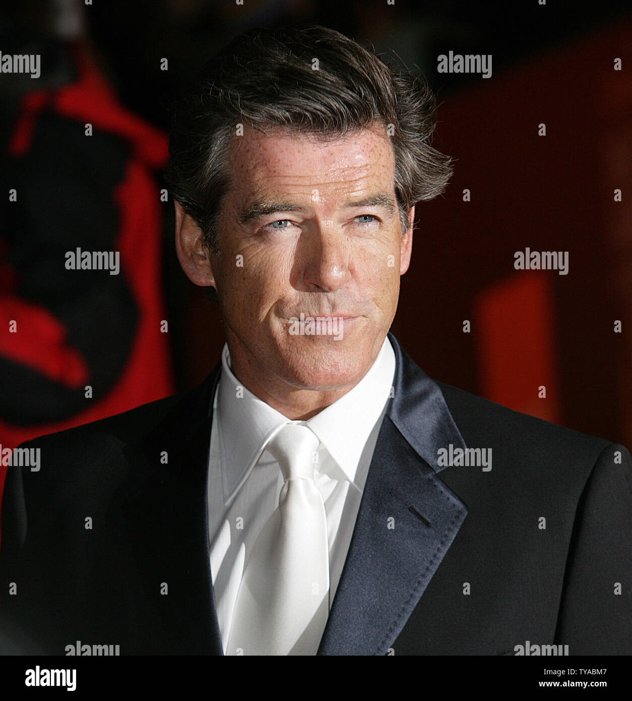 Irish actor Pierce Brosnan arrives at the British Academy Awards in London's West End on