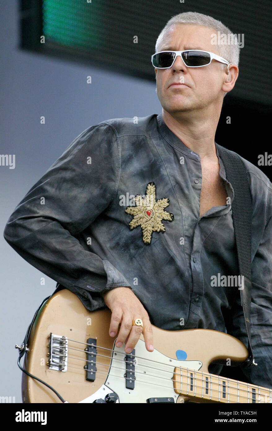 Bass player Adam Clayton of the rock group U2 performs during the