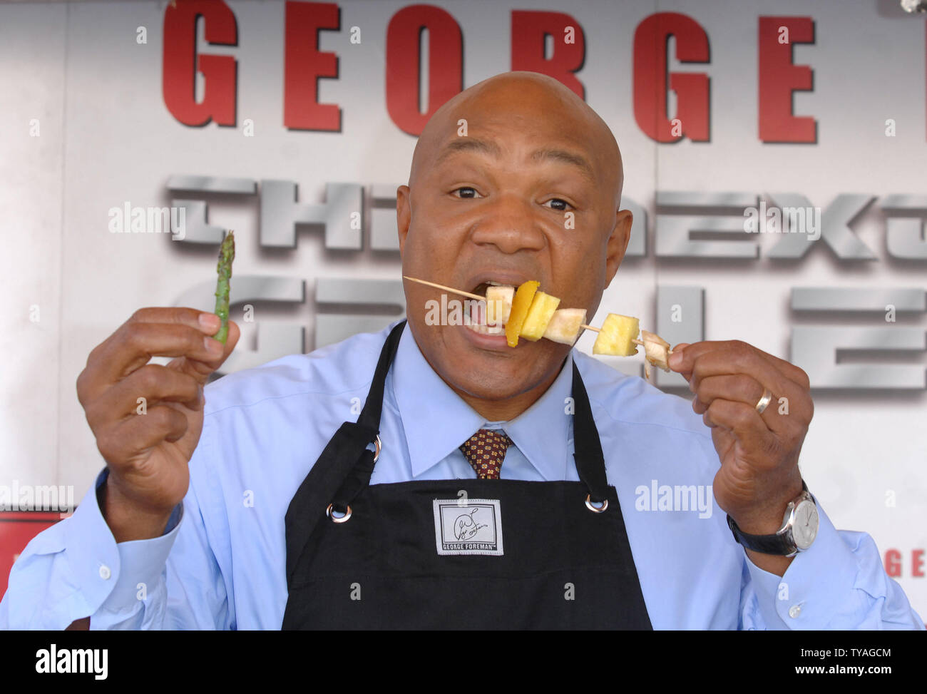 American former heavyweight boxing champion Foreman demonstrates