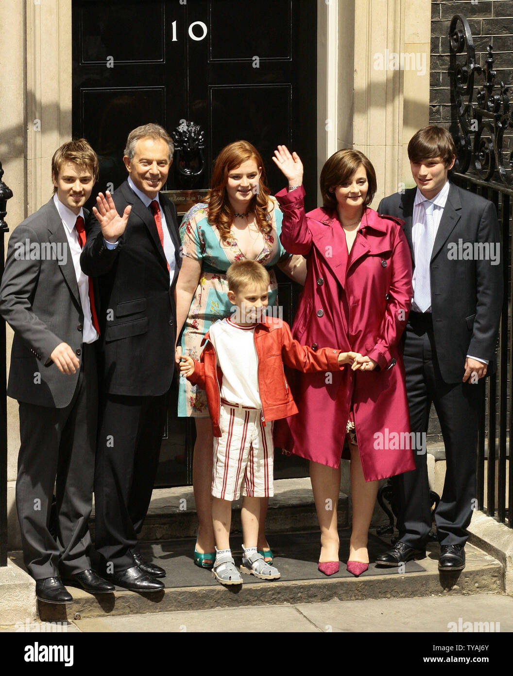The family of British Prime Minister Tony Blair, Euan, Tony Blair, Kathryn, Leo, Cherie and Nicolas (L to R) face the media on the doorstep of No.10 Downing Street after Tony Blair offered his resignation to Her Majesty the Queen on June 27, 2007. Blair leaves his role as British Prime Minister to become the Envoy to the Middle East after ten years in power. (UPI Photo/Hugo Philpott) Stock Photo