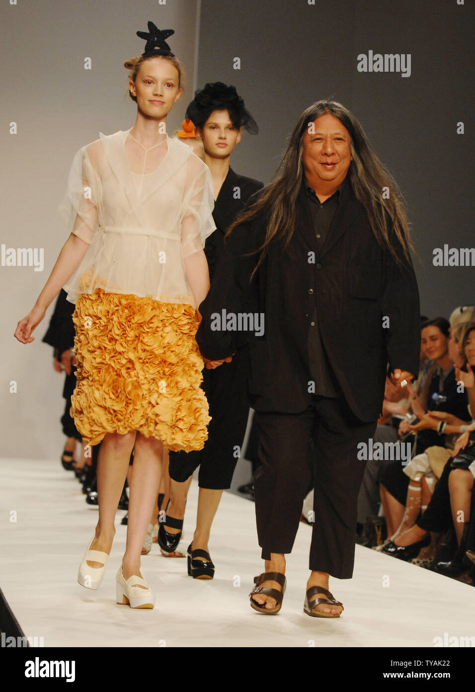 British designer John Rocha and models walks down the catwalk wearing his Spring Summer collection at London Fashion Week in London on September 17 2007. UPI Photo Rune Hellestad Stock Photo Alamy