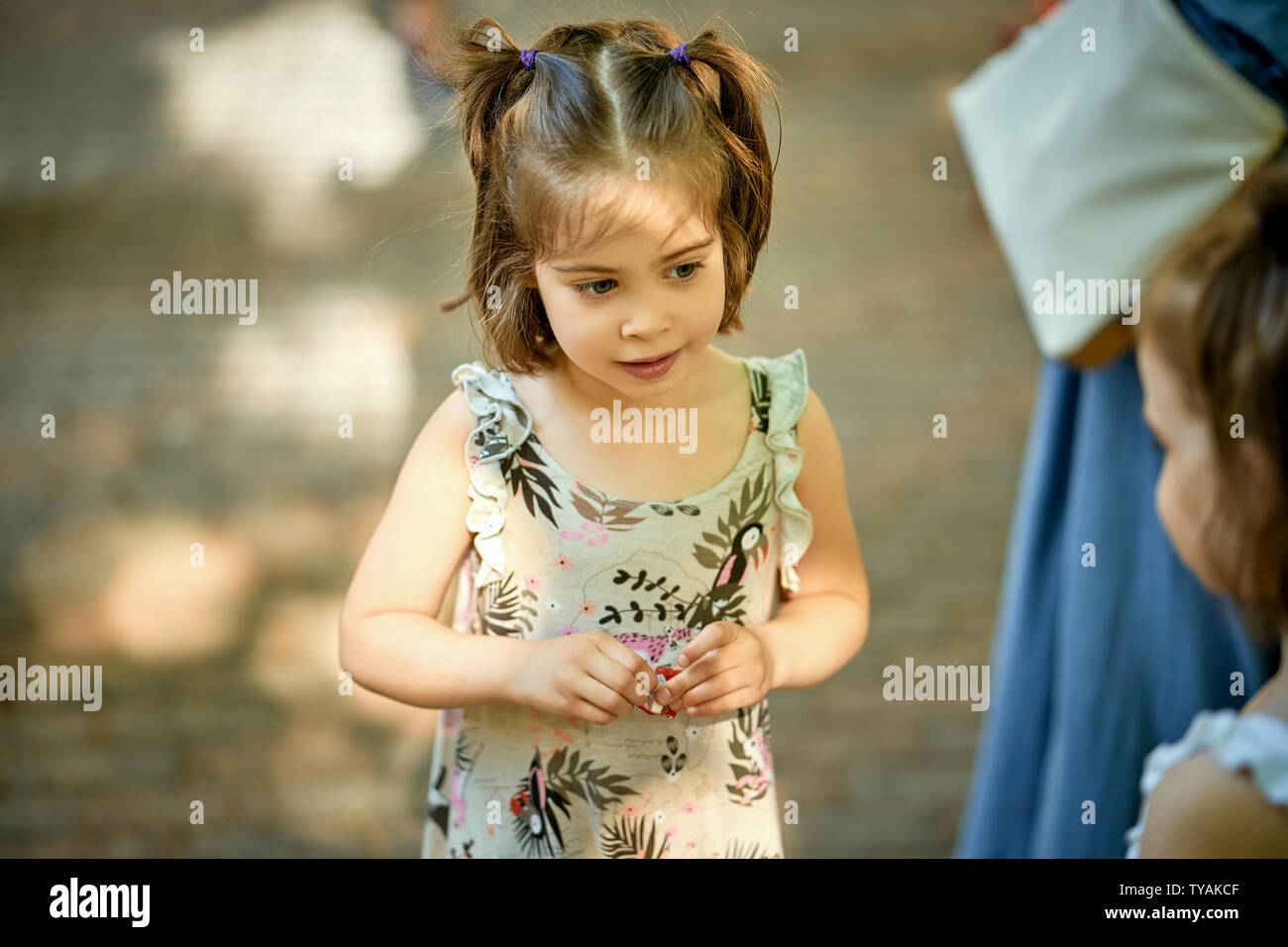 Portrait of cute little girl at playground on summer day Stock Photo ...