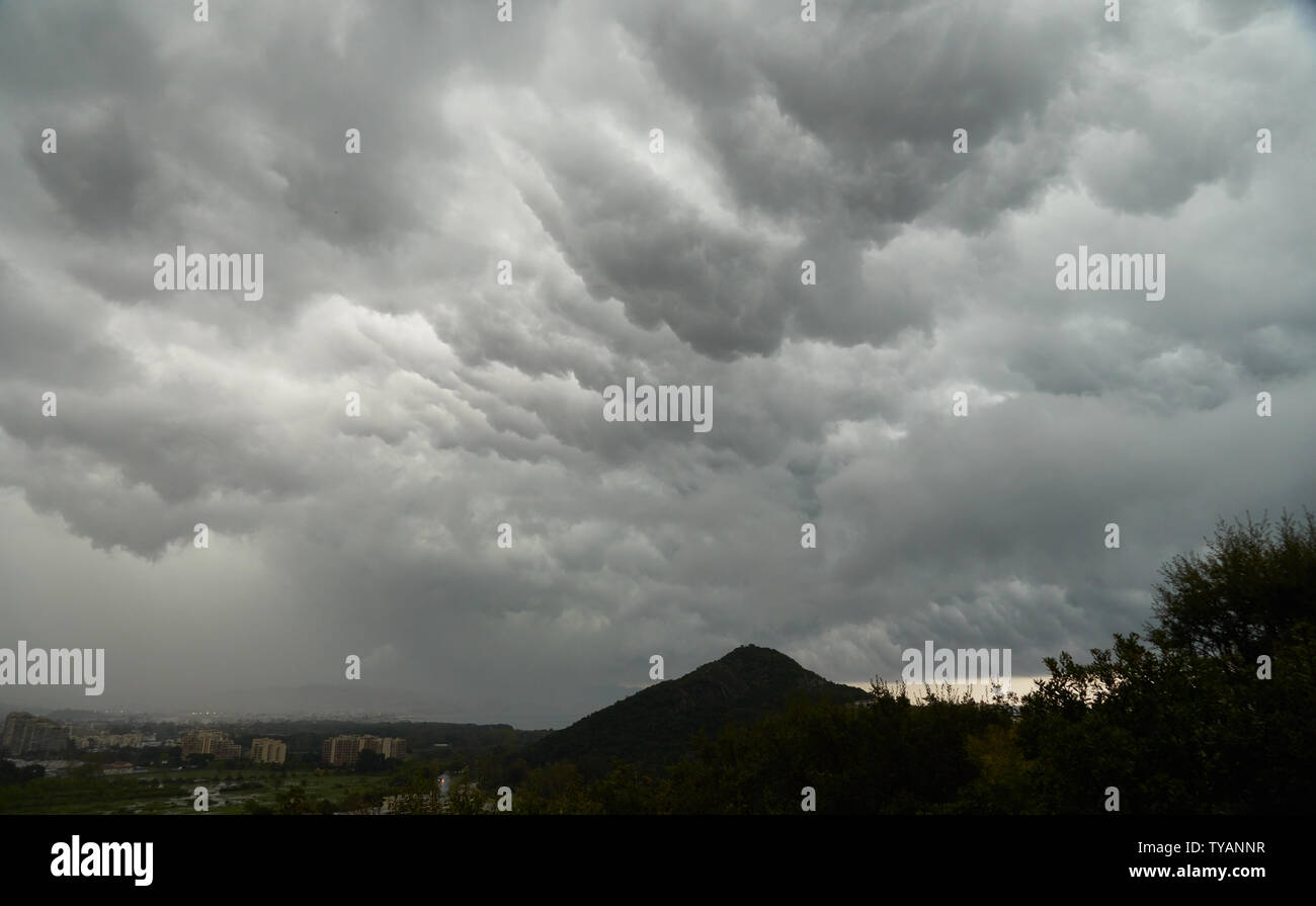 Rainy cloudscape over Mountain San Peyre in Mandelieu-La Napoule, France Stock Photo