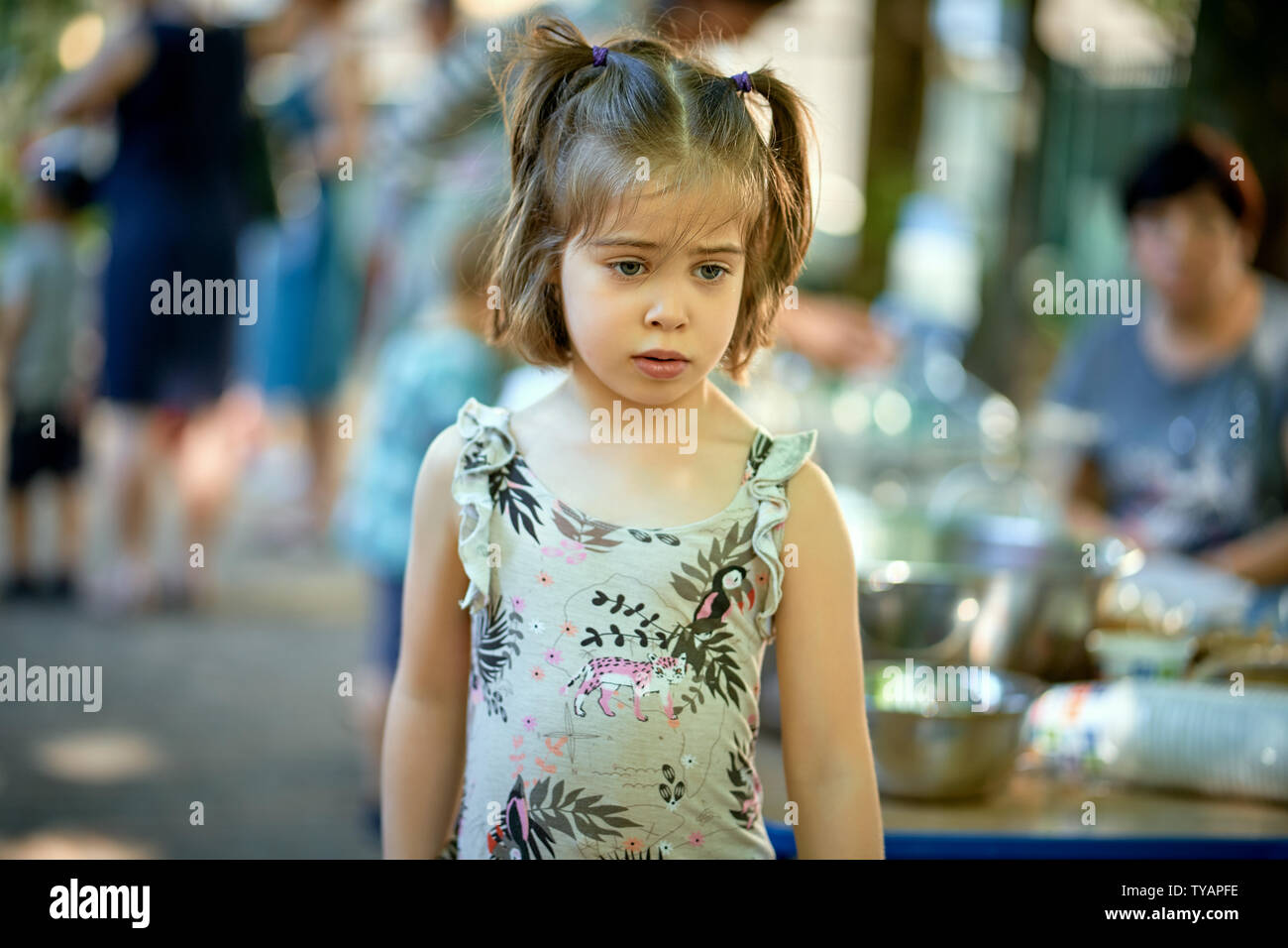Portrait of cute little girl at playground on summer day Stock Photo ...
