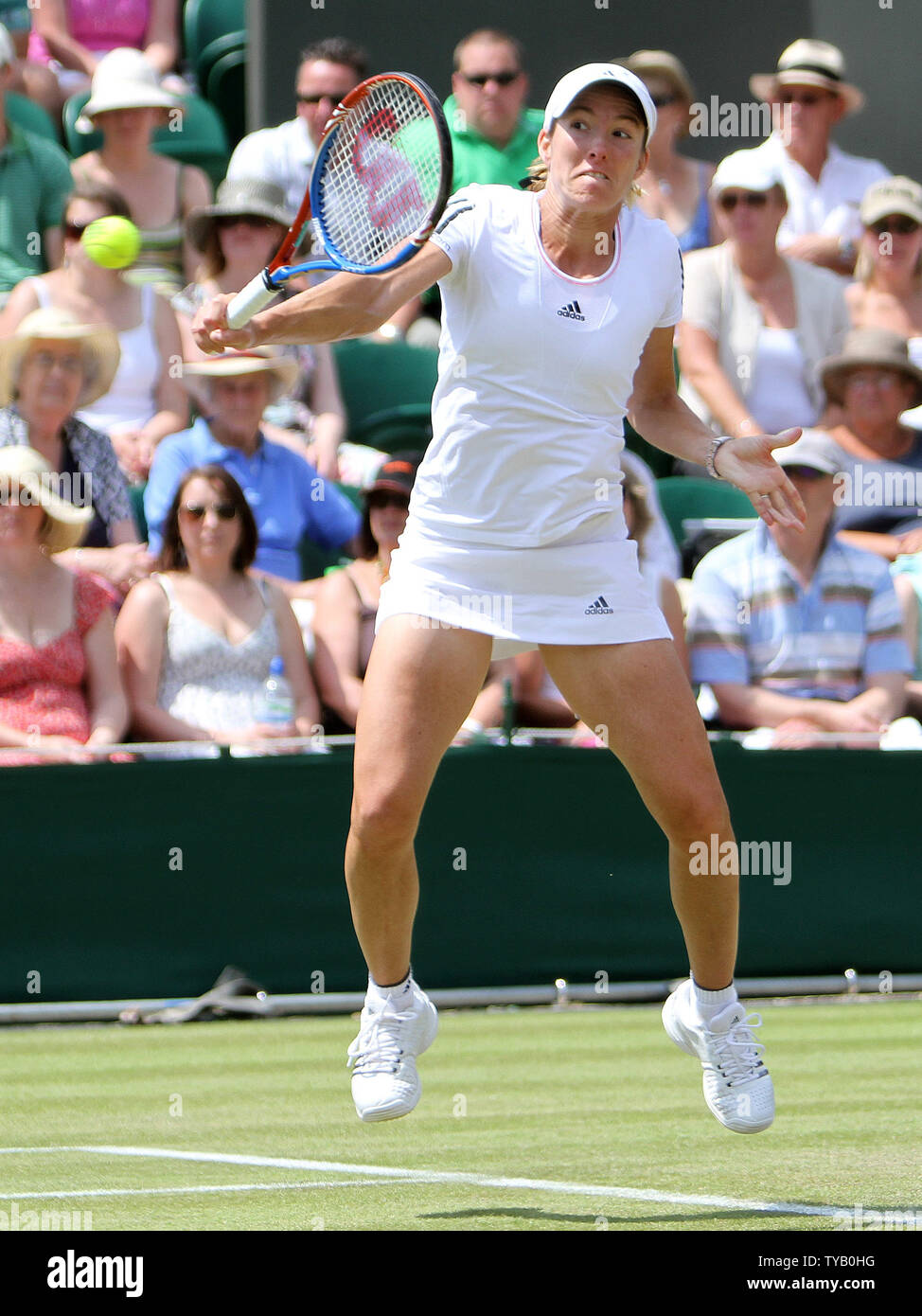 Belgian's Justine Henin plays a backhand in her match against Germany's Kristina Barrois on the third day of the Wimbledon championships in Wimbledon on Wednesday June 23 2010.      UPI/Hugo Philpott Stock Photo