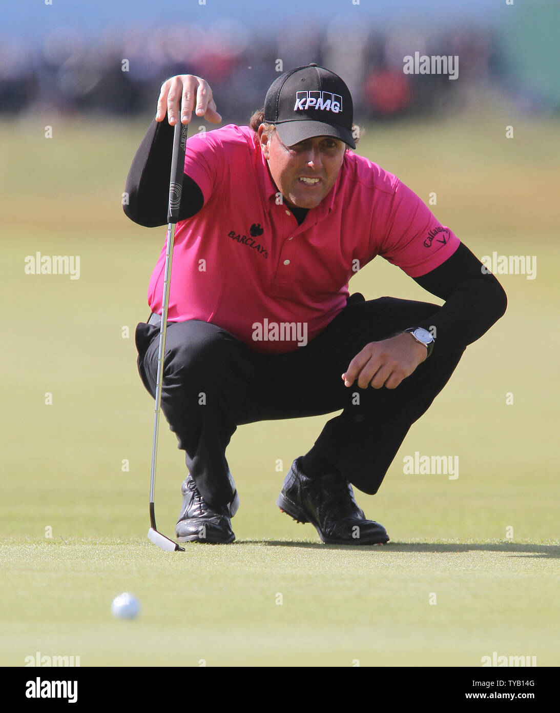 American Phil Mickelson lines up a putt on the 12th green on the first day of the Open championship in St.Andrews, Scotland on July 15, 2010.   UPI/Hugo Philpott Stock Photo