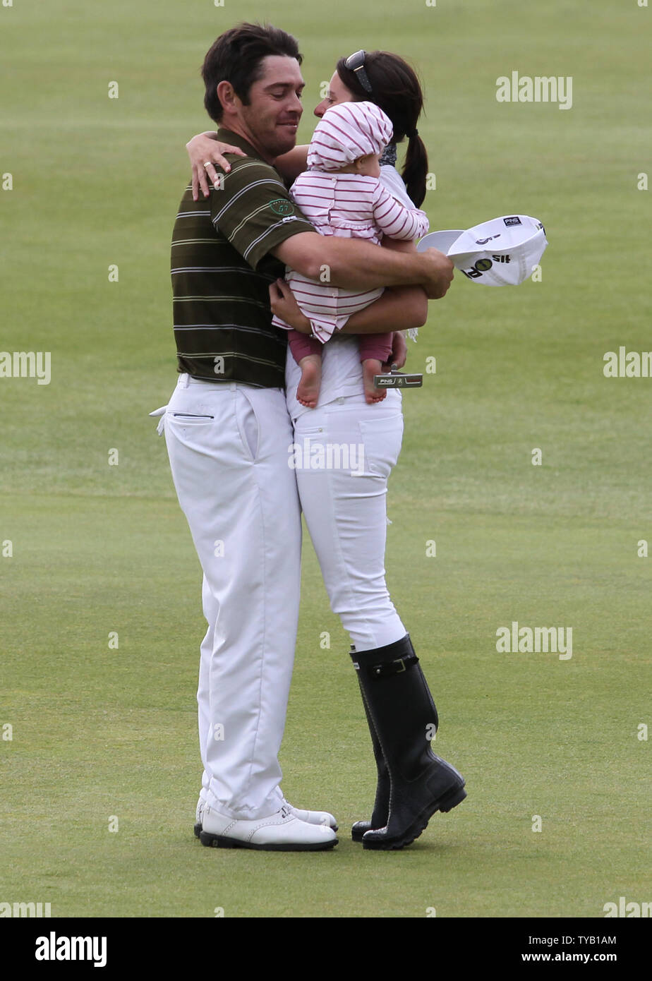 South Africa S Louis Oosthuizen Celebrates With Wife Mel And Daughter Jana After Winning The 139th Open