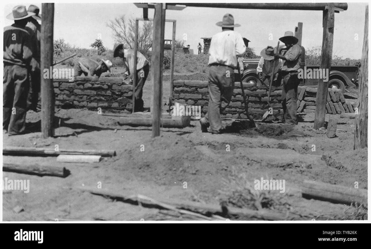 [Papago workmen building an adobe structure on the Sells Indian