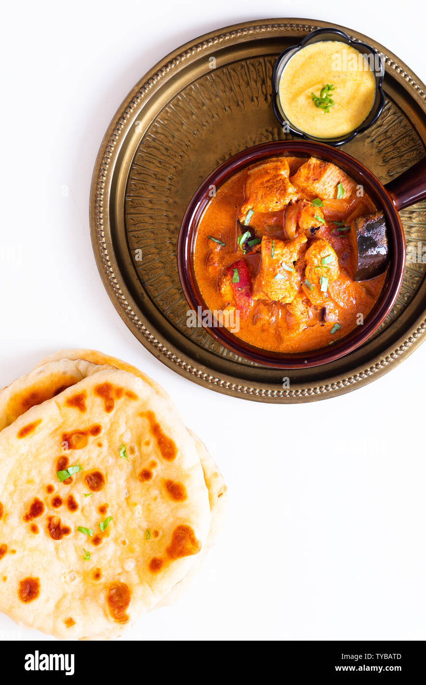 Food concept homemade Tandoori Chicken Masala curry with naan bread and