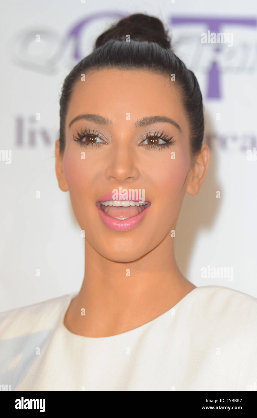 American socialite Kim Kardashian attends a photo call to promote