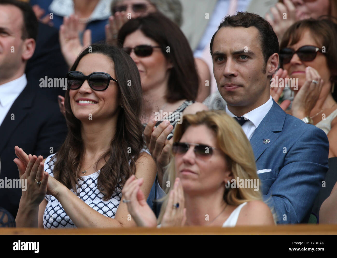 Pippa Middleton (L) and her brother James (R) enjoy the tennis in the Royal box on the fourth day of the 2012 Wimbledon championships in London, June 28, 2012.      UPI/Hugo Philpott Stock Photo
