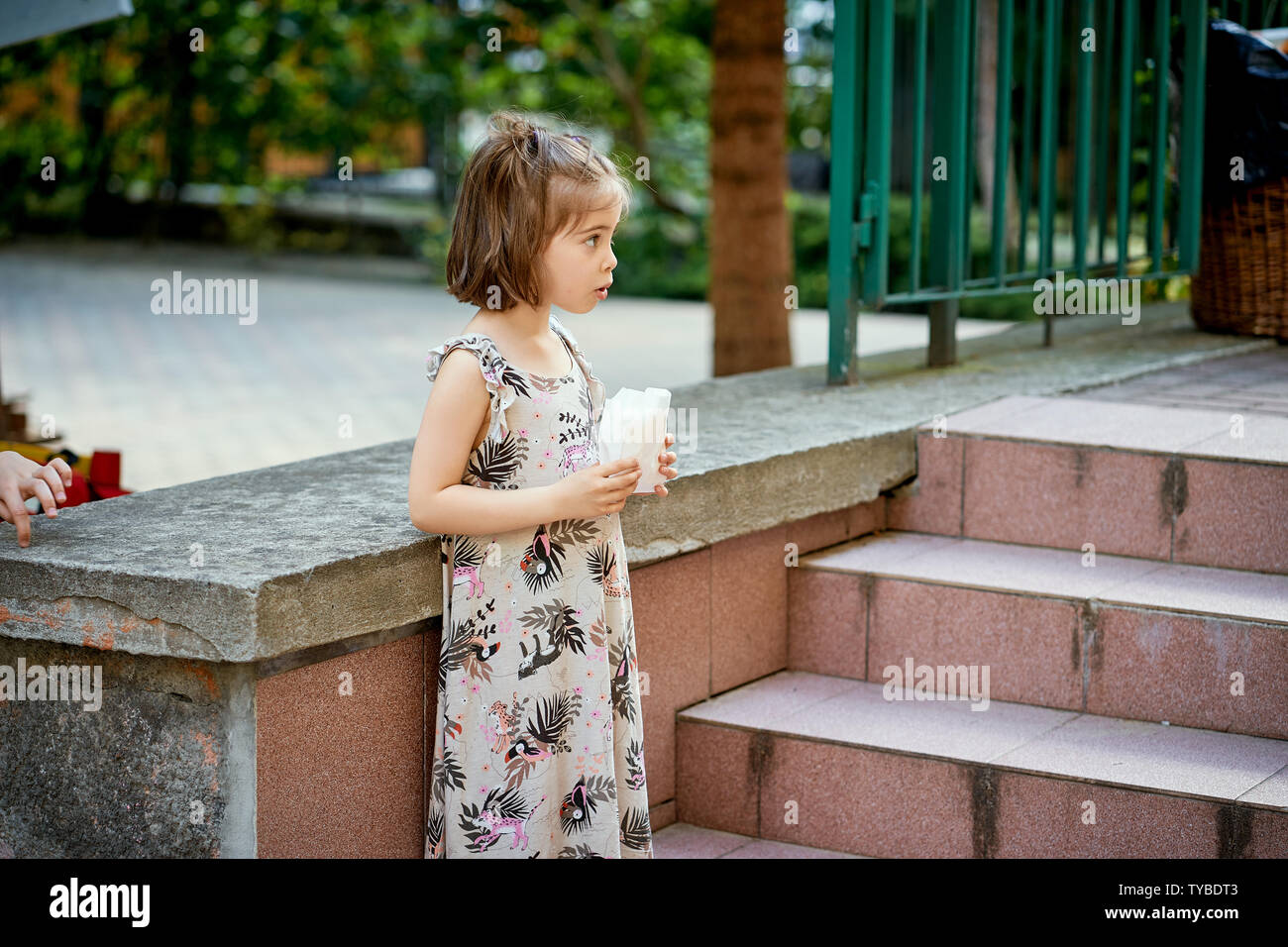 Portrait of cute little girl at playground on summer day Stock Photo ...