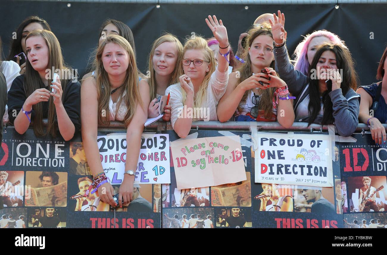One Direction Fans Attend The World Premiere Of One Direction This Is Us At The Empire Leicester Square In London On August 13 Upi Paul Treadway Stock Photo Alamy