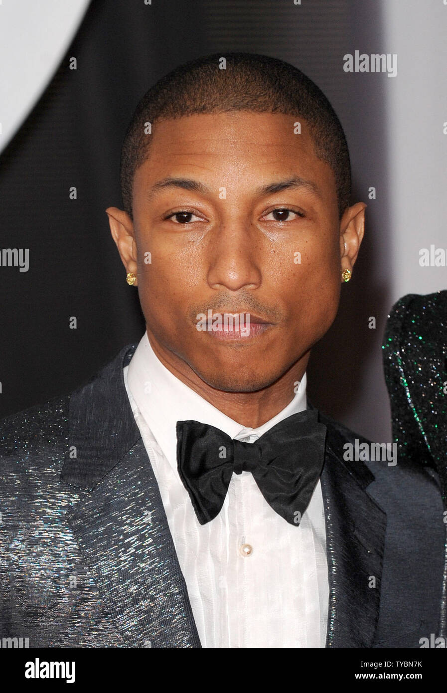 American singer/songwriter Pharrell Williams attends The Brit Awards 2014 at The O2 Arena in London on February 19, 2014.     UPI/Paul Treadway Stock Photo