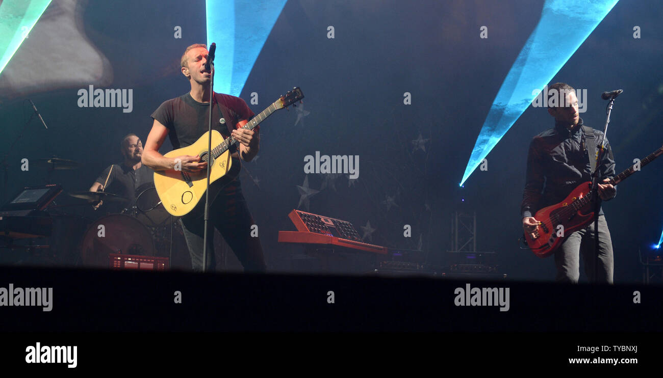 Chris Martin and Guy Berryman of the British rock band Coldplay perform live during BBC Radio 1's Big Weekend in Glasgow on May 24, 2014.     UPI/Paul Treadway Stock Photo