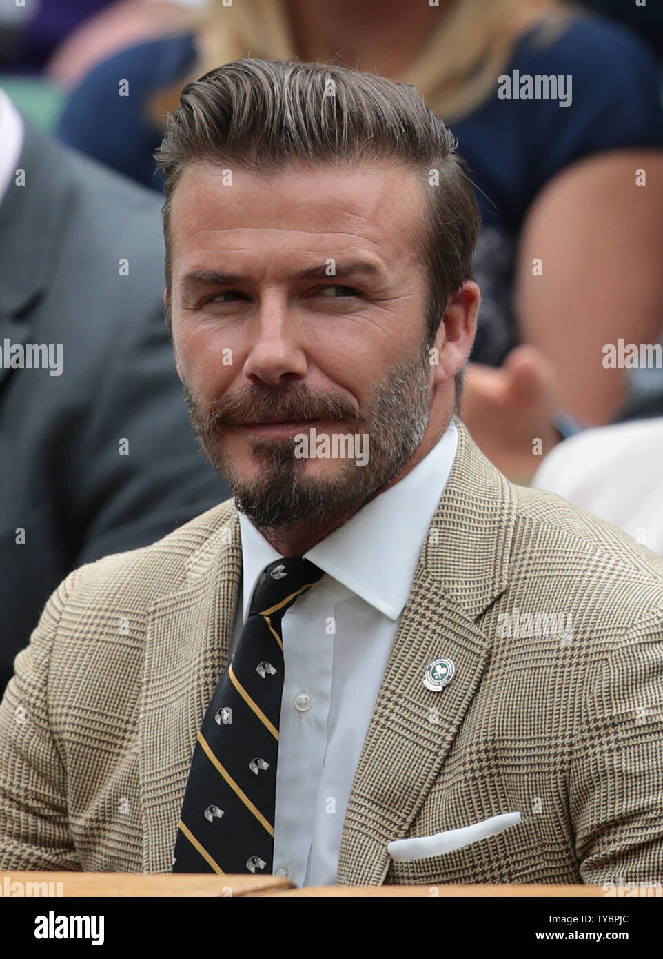 Footballer David Beckham watches the tennis from the Royal Box on day six  of the 2014 Wimbledon Championships in London on June 28, 2014. UPI/Hugo  Philpott Stock Photo - Alamy